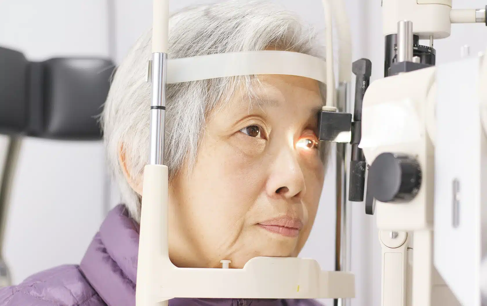 Senior woman has eye exam