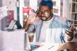 unhappy man on cell phone
