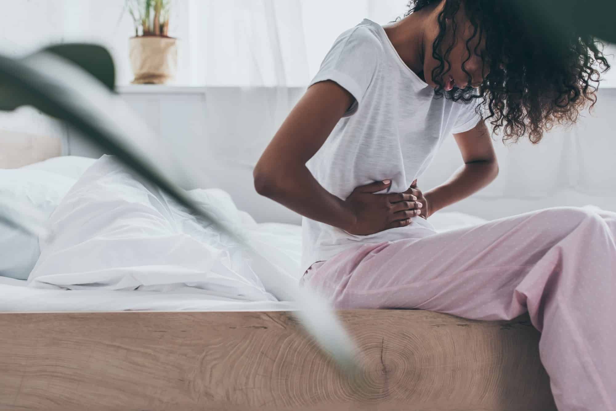 black woman suffering pain from TVT mesh
