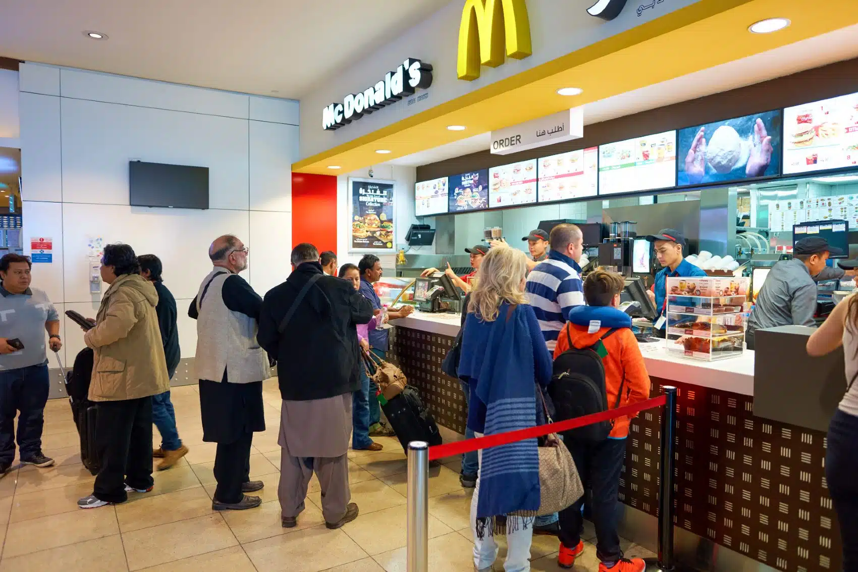 Customers place their orders at a McDonald's counter - racial discrimination