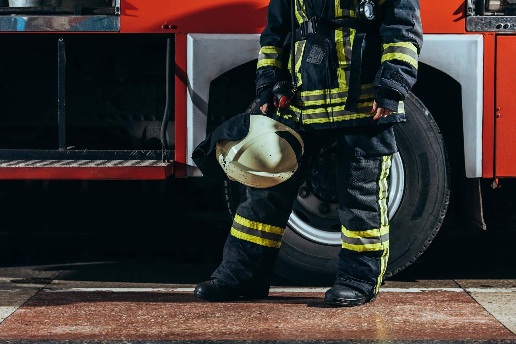 woman firefighter at firehouse at