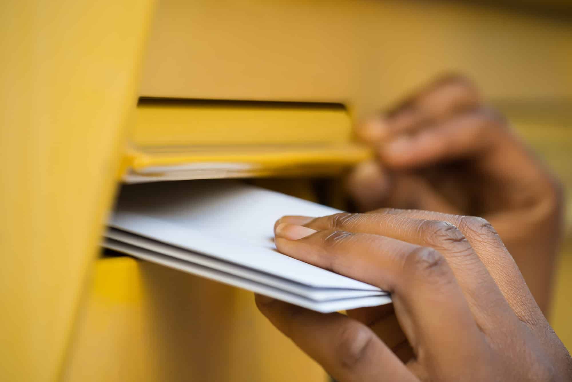 Person mailing ballots regarding the Supreme COurt decision not to extend Wisconsin Mail-In Ballot Deadline