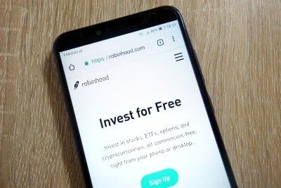 The Robinhood website is seen on a smartphone screen - Robinhood app outage