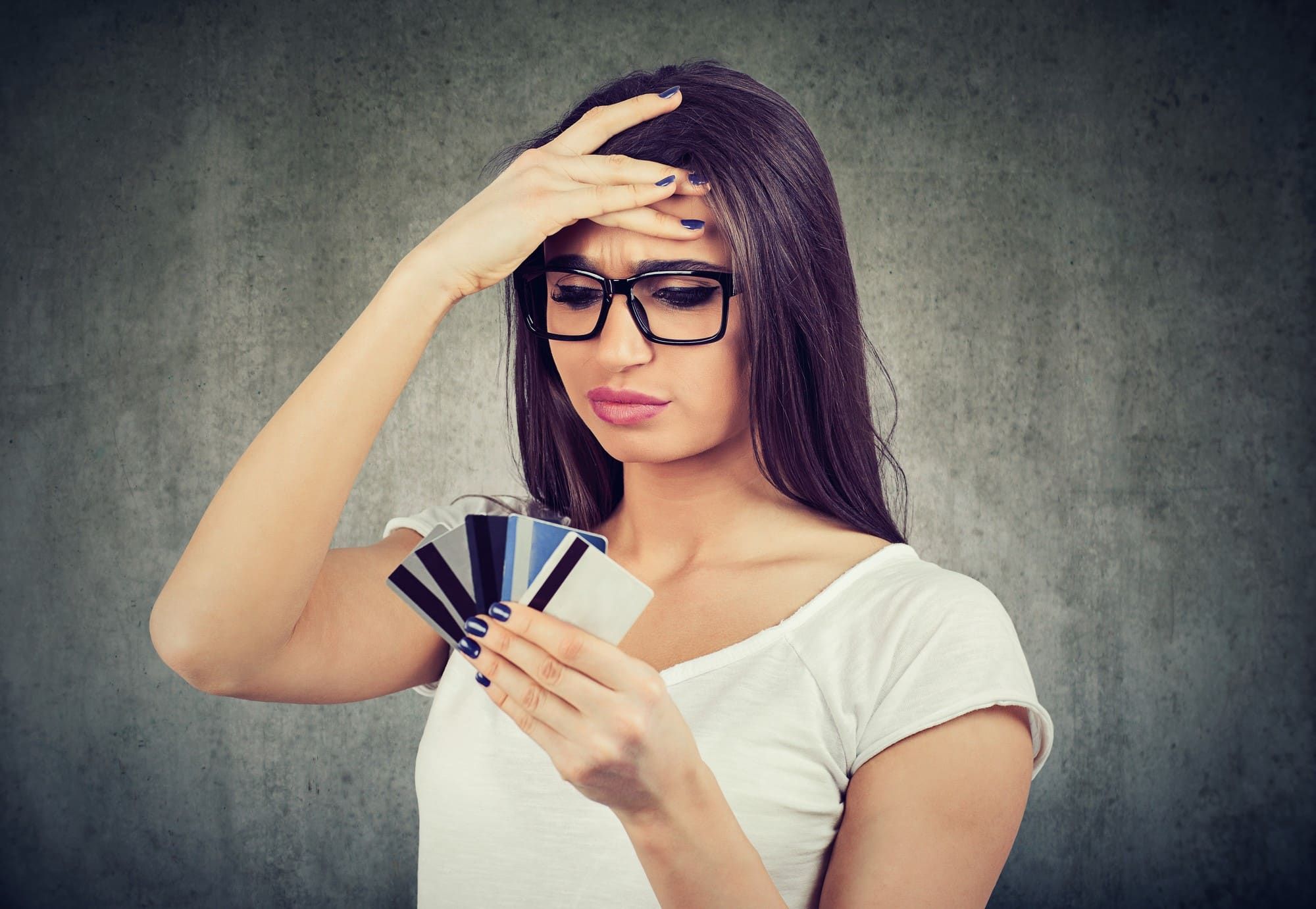 Woman stressing about foreign transaction fees on credit cards