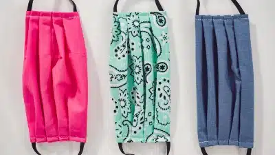 Three face masks in various colors and patterns - sales tax