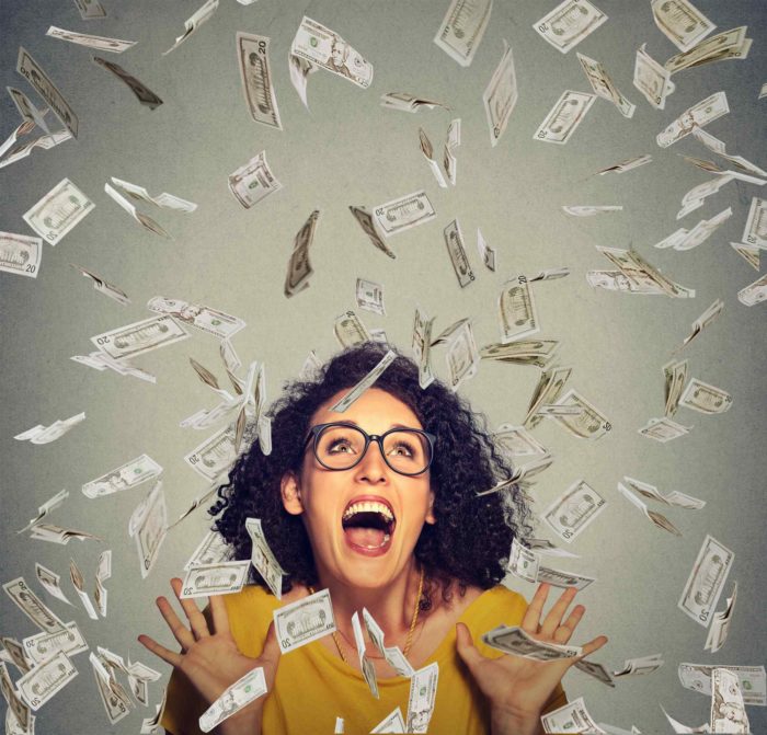 class action rebates money falling onto a woman