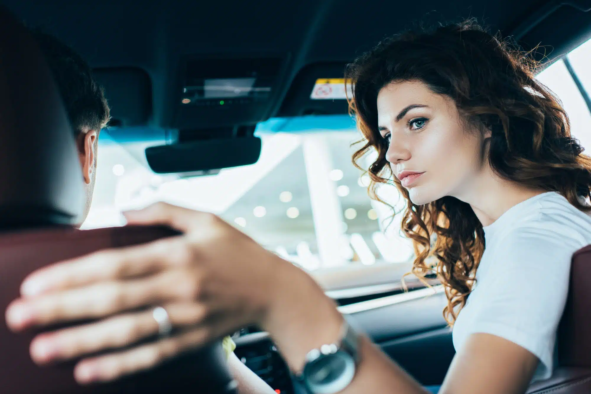 woman in passenger seat of rideshare car