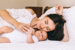 Mom and baby in bed