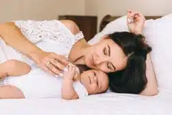 Mom and baby in bed
