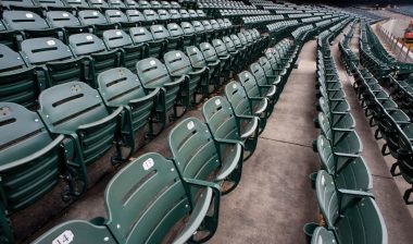 Green stadium seats sit empty during the pandemic - minor league baseball