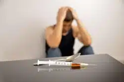 Person struggling with a drug