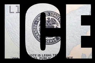 Black "ICE" cutout with document behind the letters - medical abuse