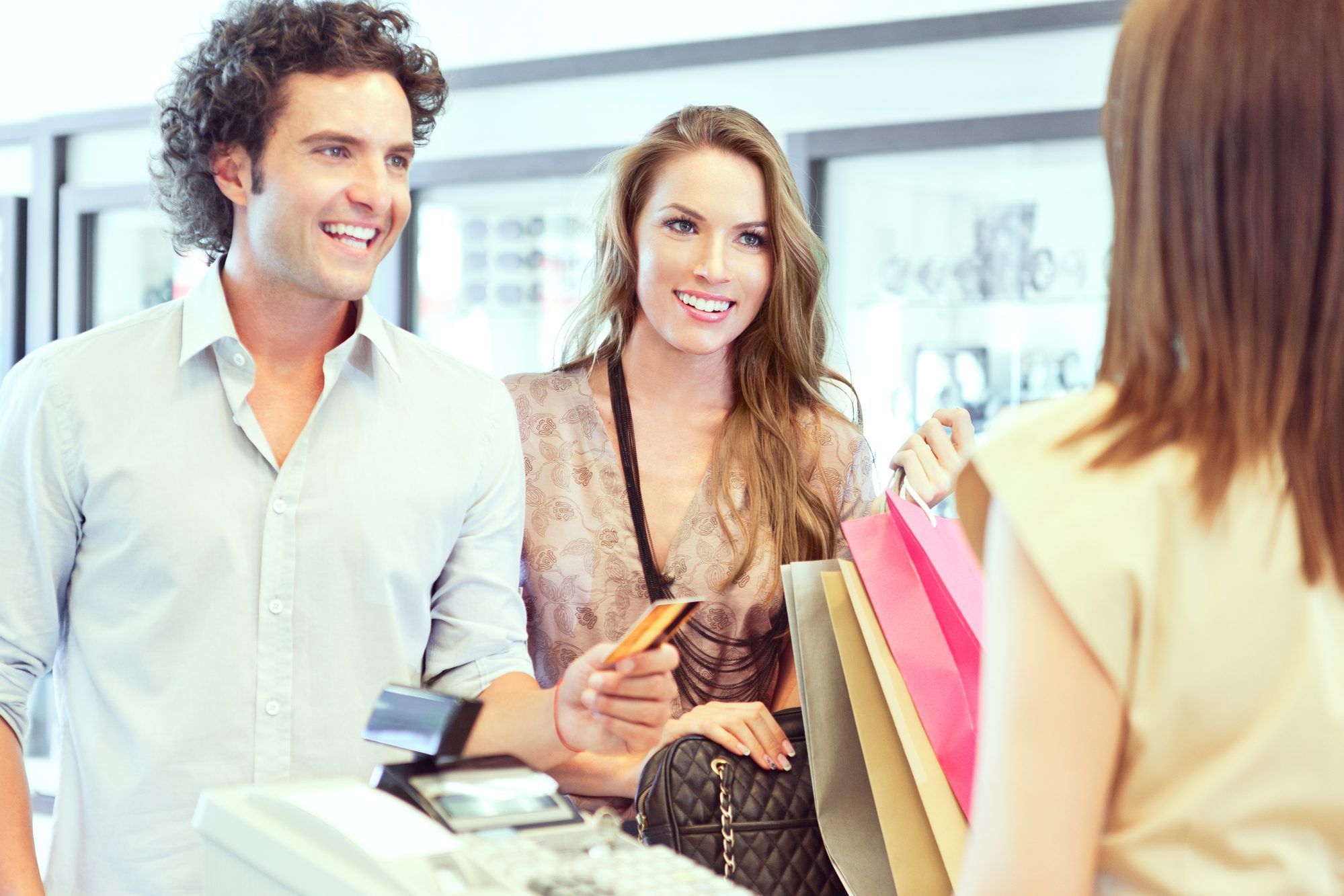 young couple purchasing gifts