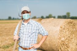 Farmworkers are challenging a move by the Trump administration to freeze wages.