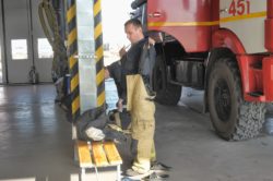 Truck driver making sure his freight is ready