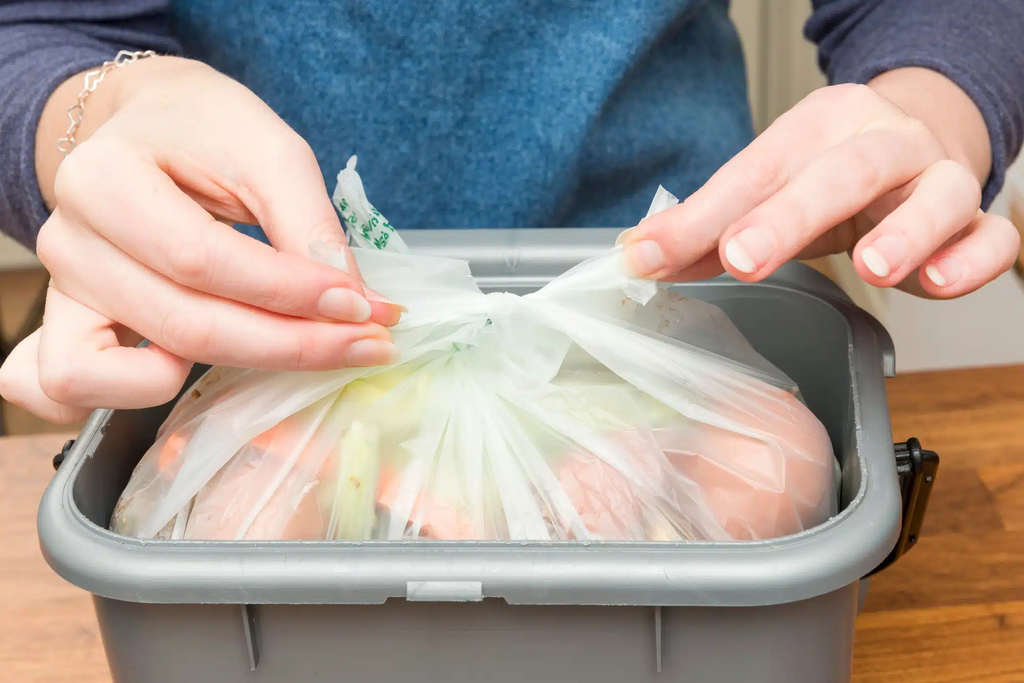 Biodegradable trash bags are probably better for the environment.