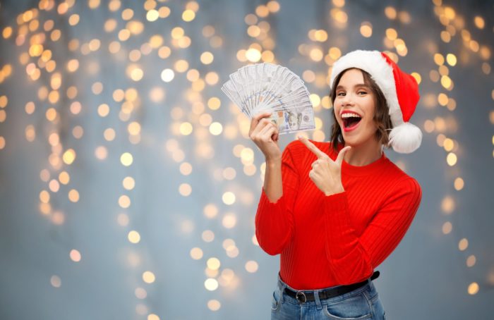 women getting class action settlement checks in the mail