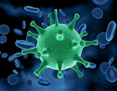 Rendering of a green coronavirus - See's Candies worker