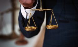 scales-of-justice-in-hand