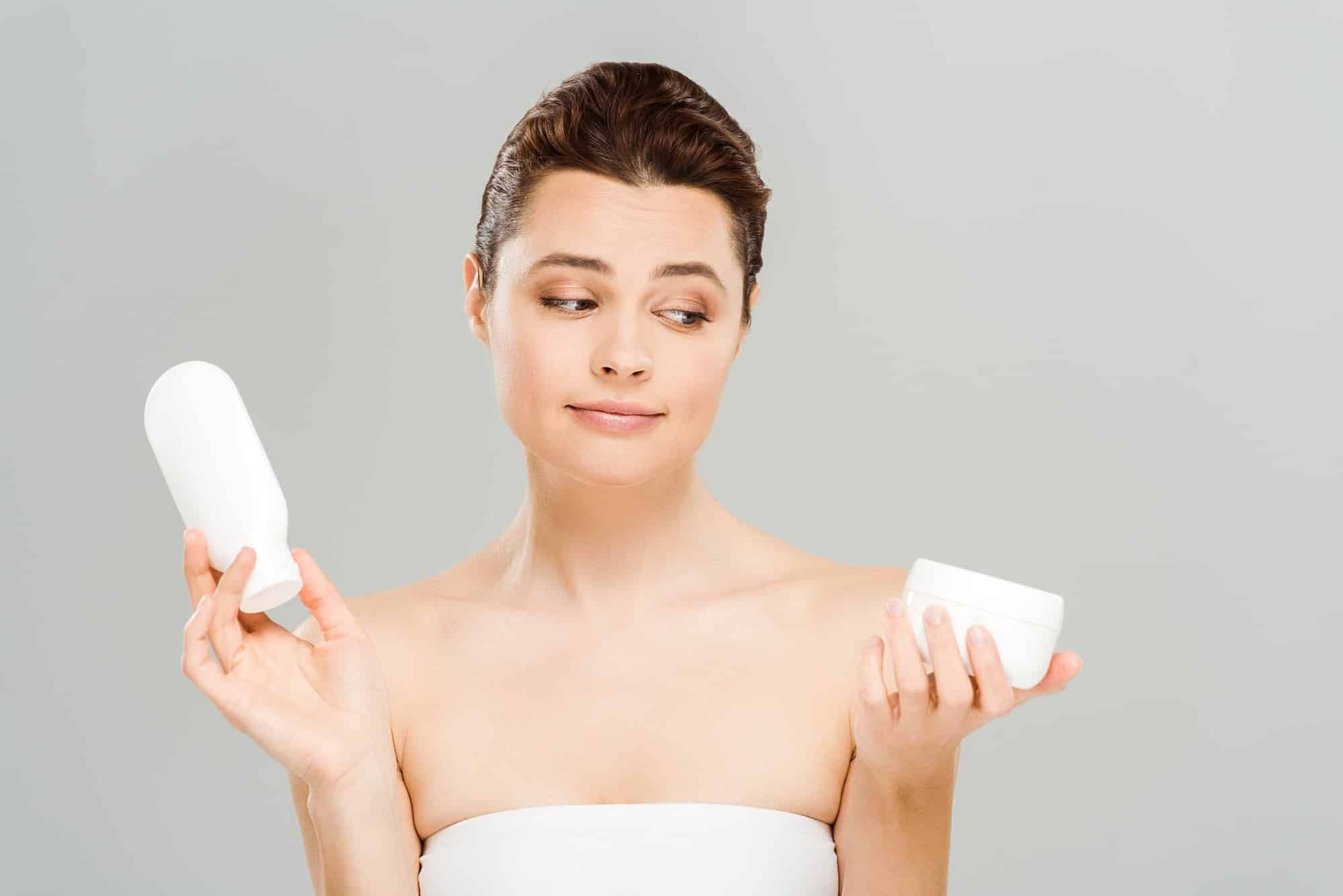 woman looking at skincare products