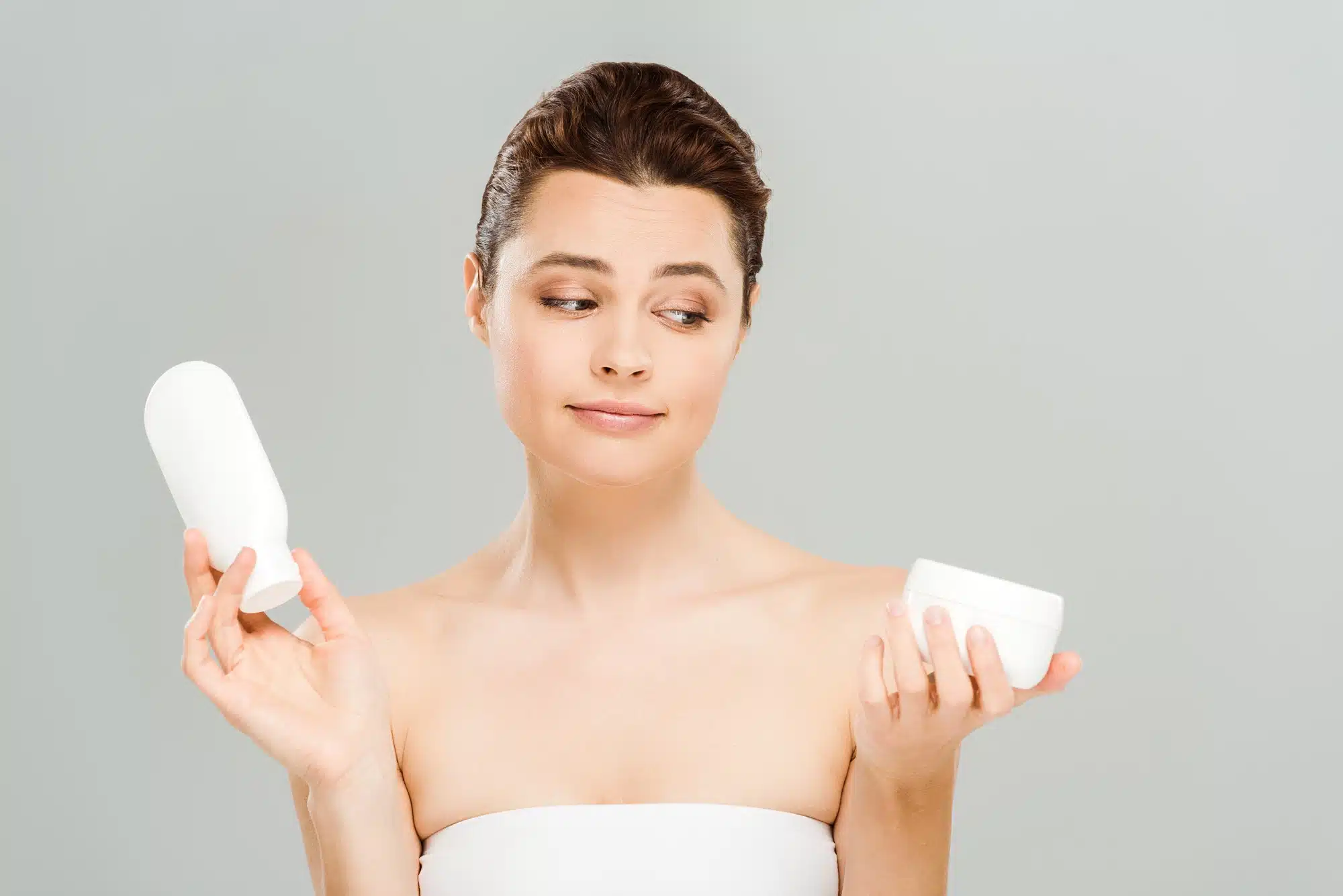 woman looking at skincare products