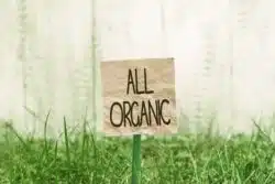 SIgn depicting organic grass
