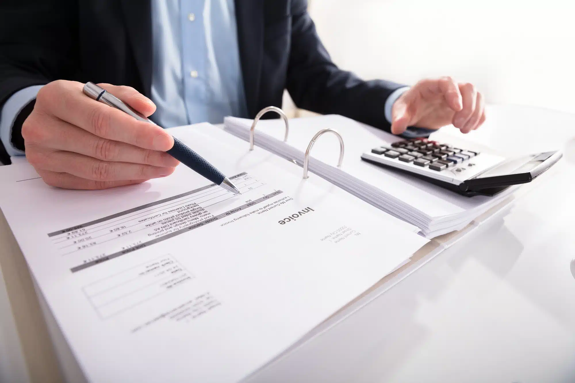 Person adding up paycheck regarding Lowe's sick time pay