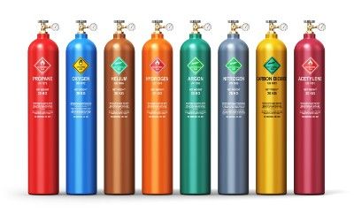 A row of colorful gas cylinders - fuel surcharge