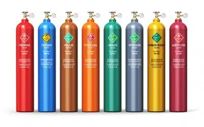 A row of colorful gas cylinders - fuel surcharge