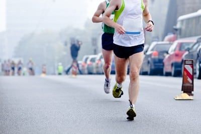 Runners participate in a city race - Ironman race