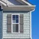Siding shingles around a window on house - Allura fiber cement siding