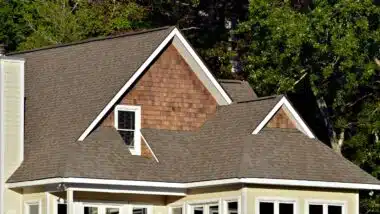 Siding shingles in the gables of a house - Allura fiber cement siding