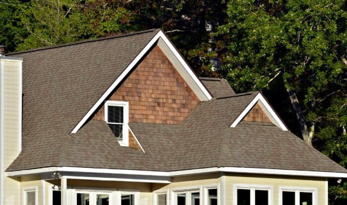 Siding shingles in the gables of a house - Allura fiber cement siding