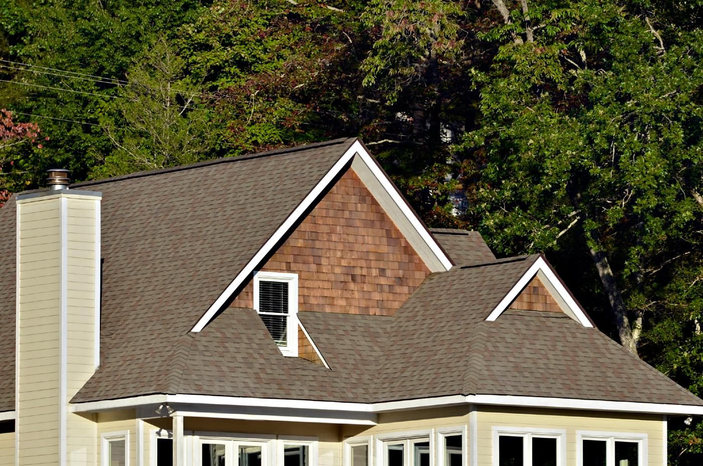 Siding shingles in the gables of a house - Allura fiber cement siding