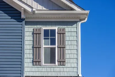 Siding shingles around a window on house - Allura fiber cement siding