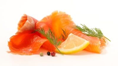 Smoked salmon garnished with lemon and capers - Mowi USA - Ducktrap Ducktrap River of Maine
