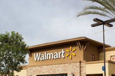 Walmart sign on store front - Walmart military leave