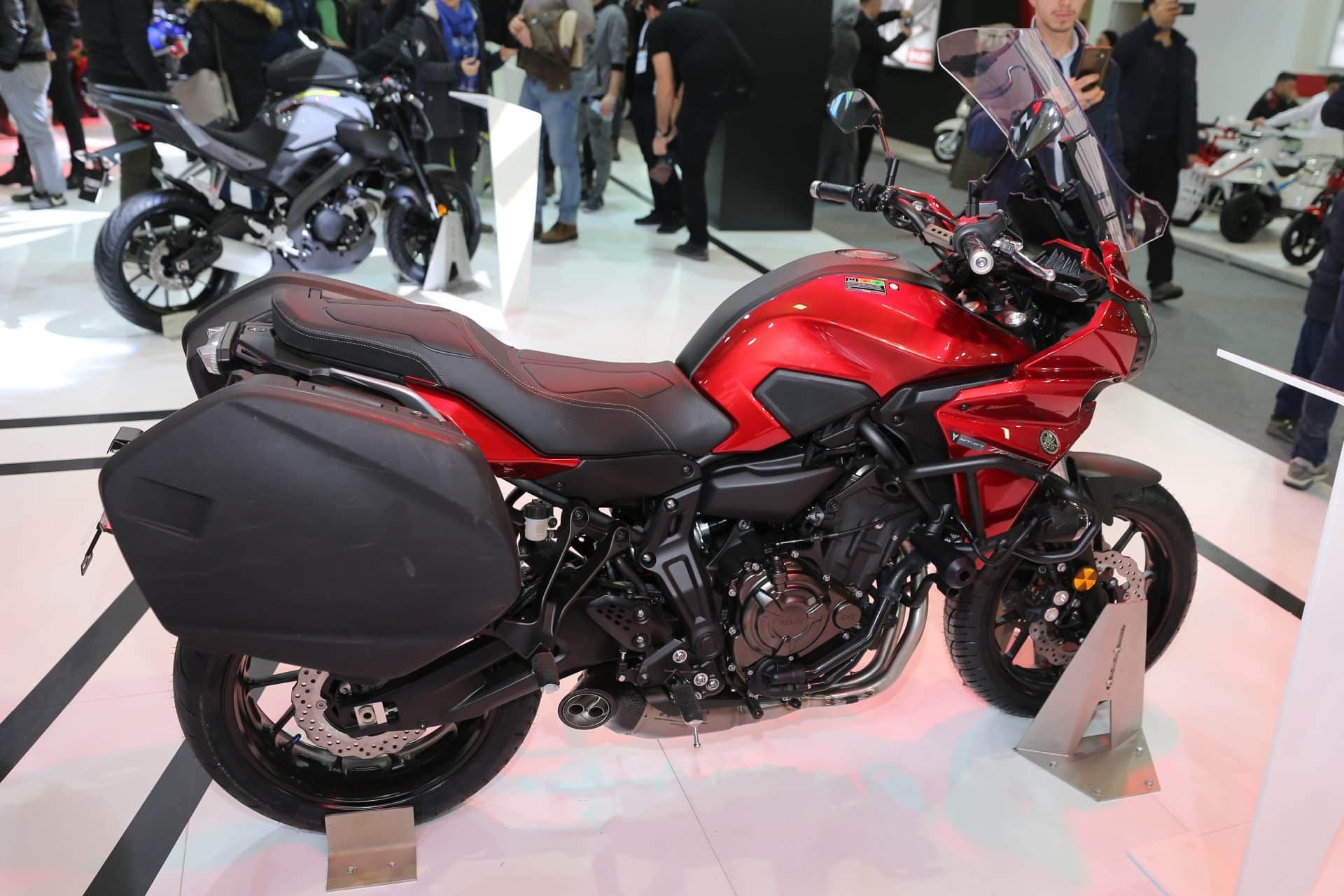 Red Yamaha motorcycle in a showroom - brake switch