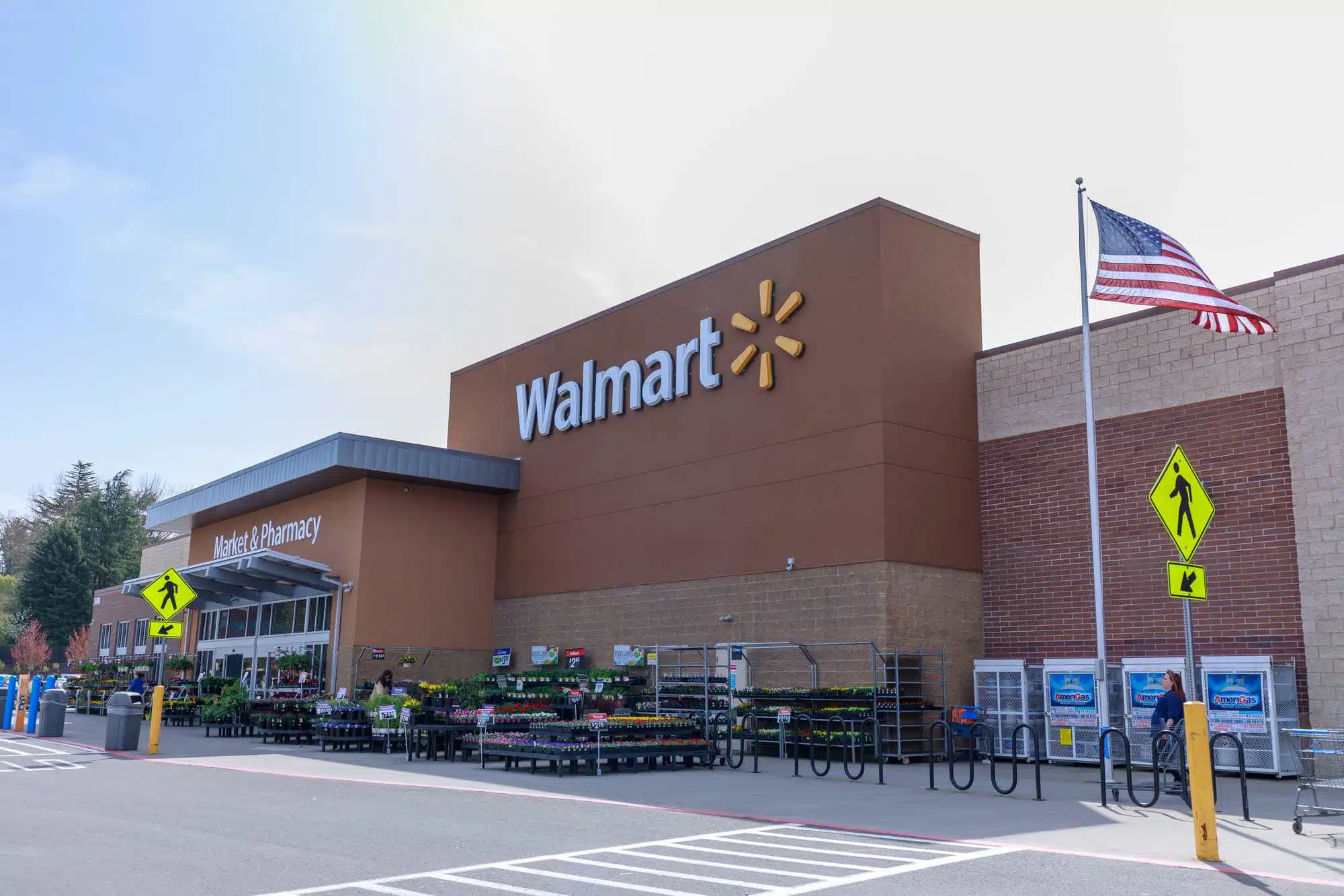 A Walmart class action lawsuit has been filed by employees over unpaid COVID-19 screening times.