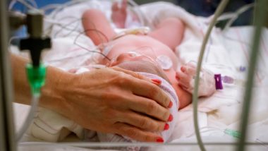 baby in incubator in NICU