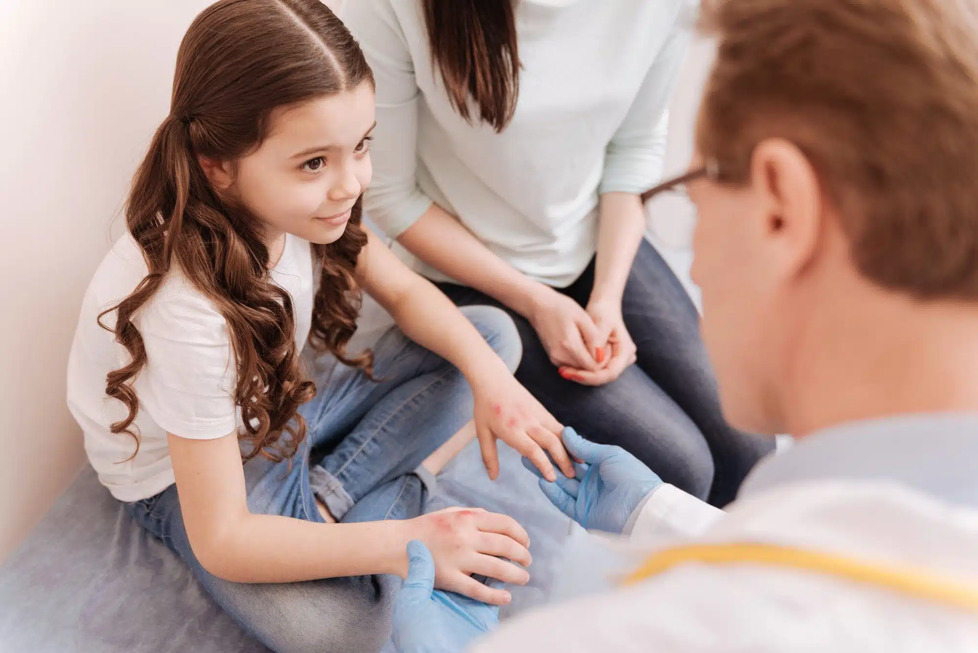 child at pediatric office with doctor