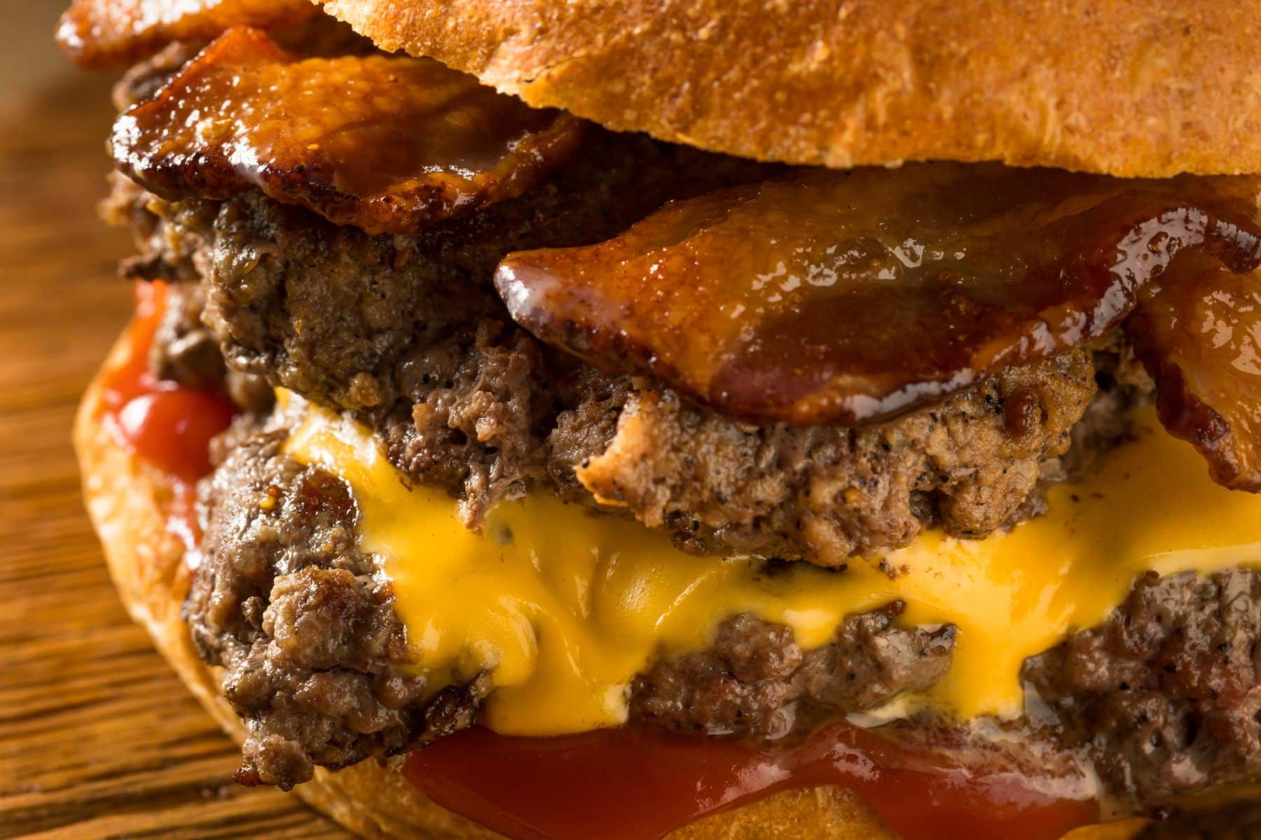 Burger with bacon, cheese, and two beef patties - smashburger settlement