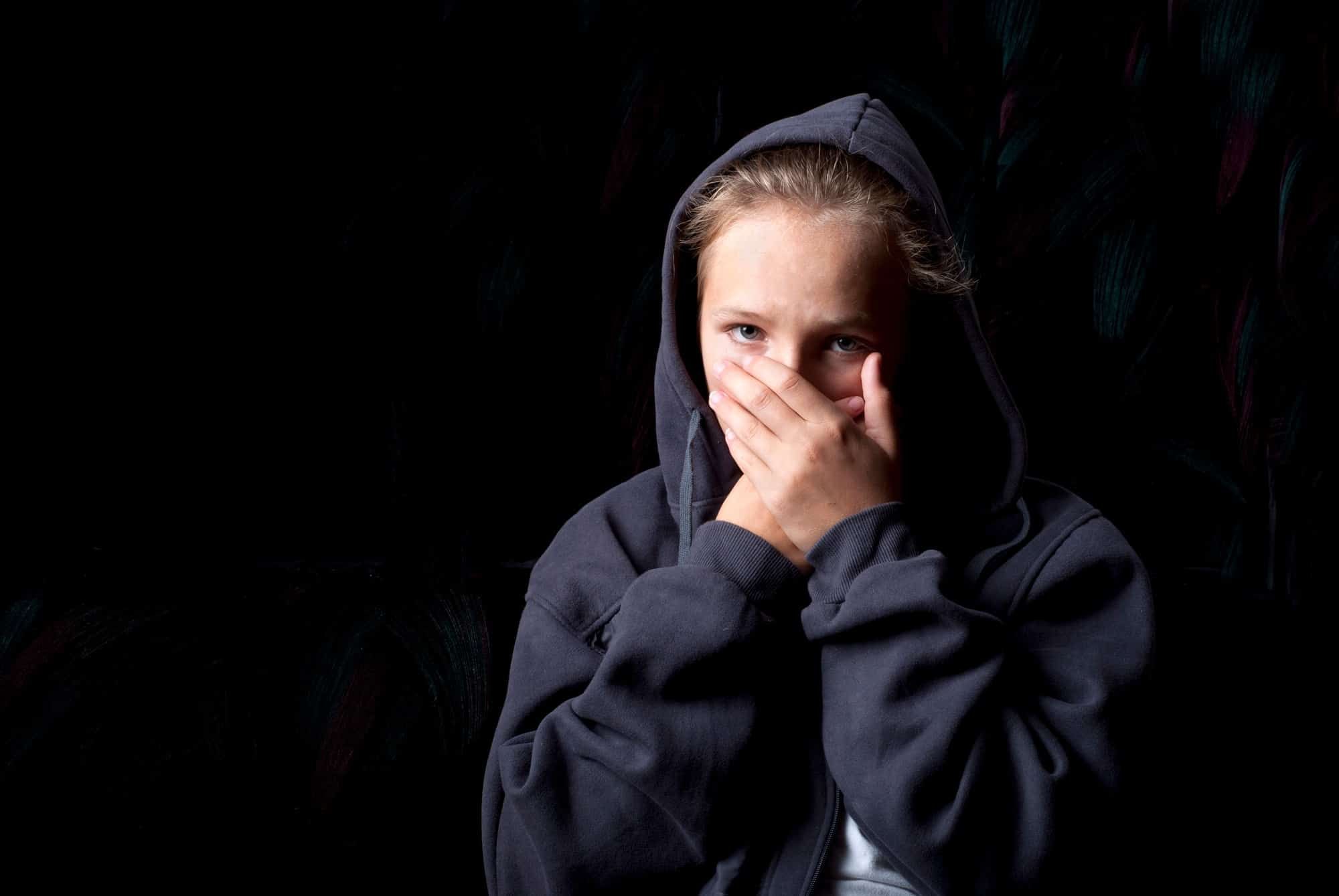 teenage boy keeping quiet about sexual abuse