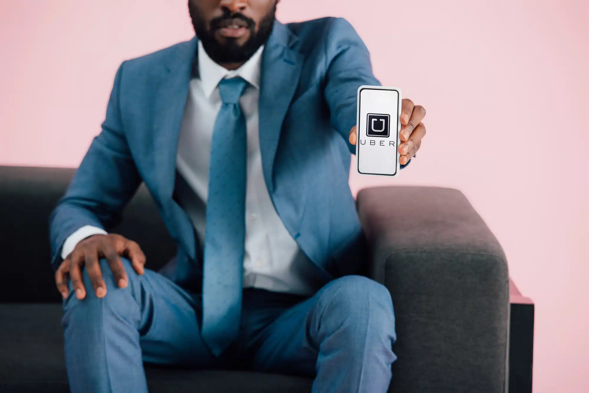 A class action lawsuit claims Uber background checks hurt Black, Latinx drivers.