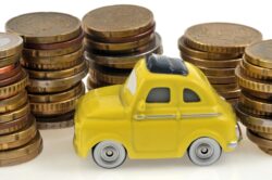 toy car and stacks of coins