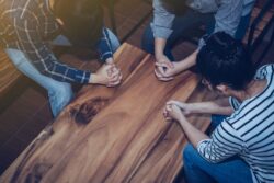 youth church group praying