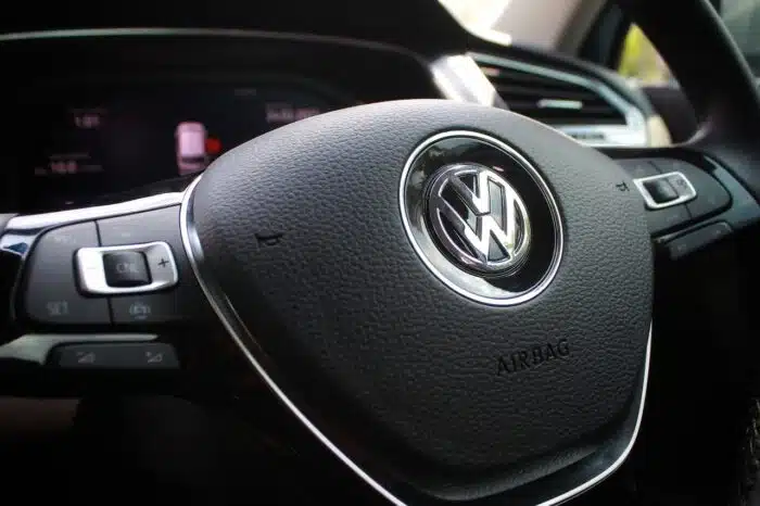 A $14.7 billion settlement was approved in 2019 in connection with the Volkswagen emissions scandal.