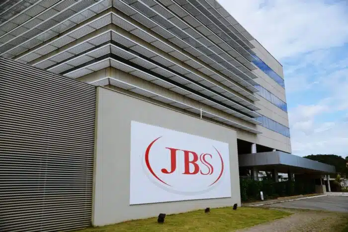 A sign outside a JBS office building - Pork prices - indirect purchaser, pork class action settlement