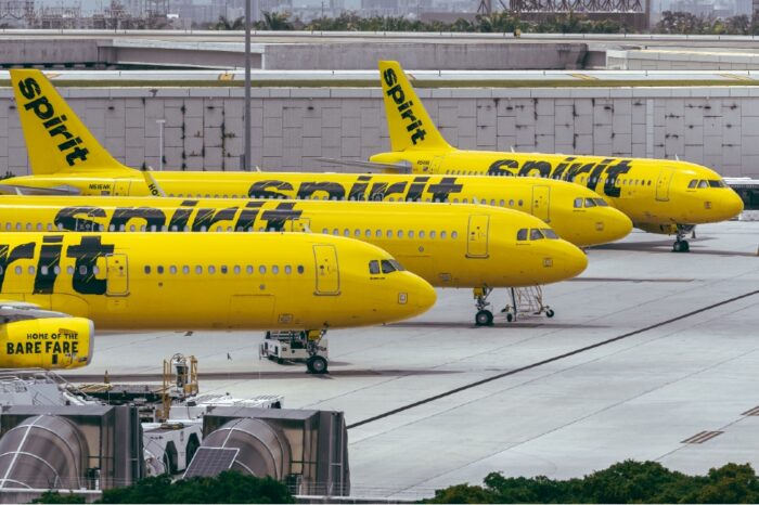 American Airlines and Spirit Airlines have both cancelled more than 1,000 flights in the last few days, but if customers want to sue, they're probably out of luck.