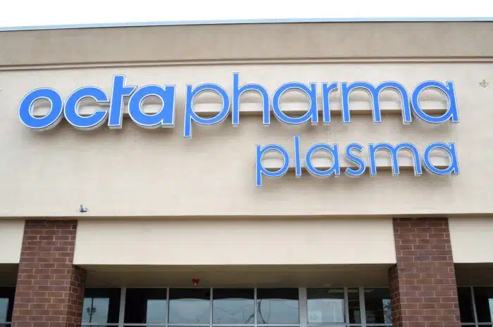 Octapharma Plasma sign on building - plasma donation
